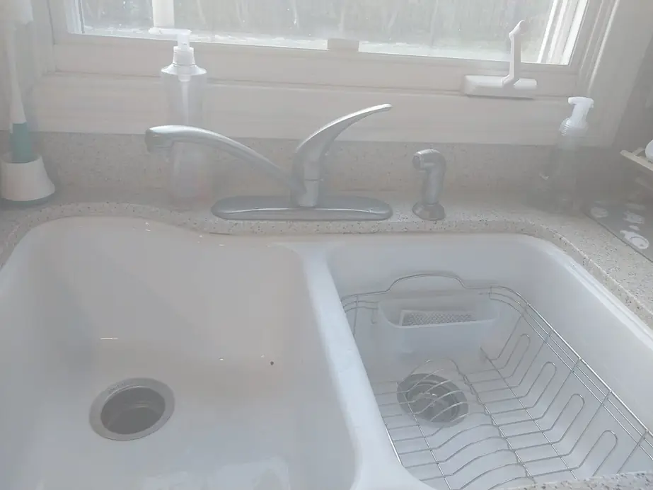 Kitchen sink and faucet after repair work